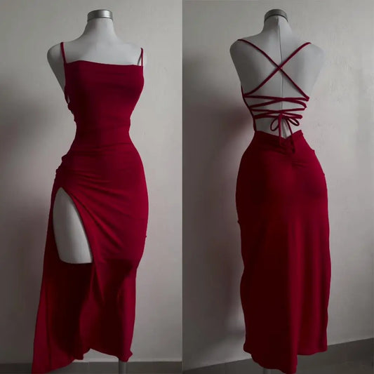 Open back, halter strap Spice Girl bag hip dress