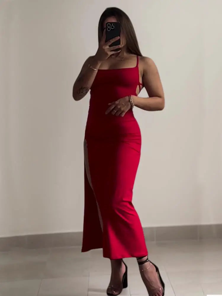 Open back, halter strap Spice Girl bag hip dress